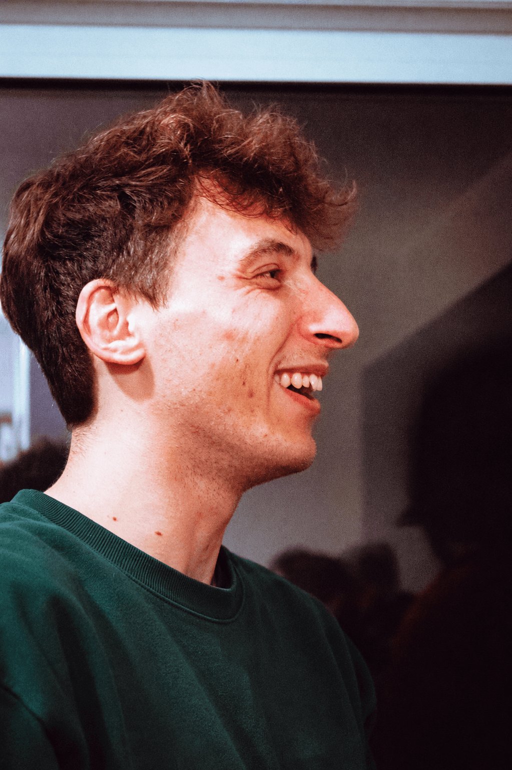Quentin, laughing, in profile